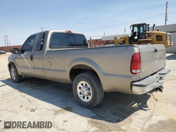 2005 Ford Super Duty F-250 XL with VIN 1FTSX205X5EA72216, listed as a Copart auction lot 71741104 with 217,205 mi miles and Salvage Title. Bid and sale history available at carsss.com. Image 2.
