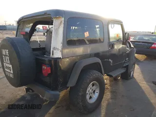 2005 Jeep Wrangler Unlimited with VIN 1J4FA44S35P314941, listed as a IAAI auction lot 41278276 with 248,865 mi miles. Bid and sale history available at carsss.com. Image 4.