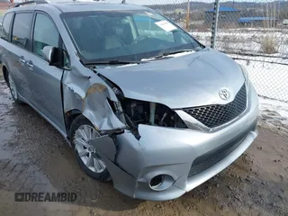 2013 Toyota Sienna SE with VIN 5TDXK3DC0DS354540, listed as a IAAI auction lot 41445501 with 238,814 mi miles and . Bid and sale history available at DreamBid. Image 6.