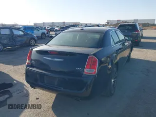 2013 Chrysler 300 with VIN 2C3CCABG7DH573164, listed as a IAAI auction lot 41851066 with 218,234 mi miles. Bid and sale history available at carsss.com. Image 4.