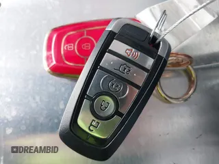 2022 Ford Explorer ST-Line z VIN 1FMSK7KH5NGA21032, wystawiony jako IAAI lot #42212415 z przebiegiem 49 034 mil mil oraz . Historia ofert i sprzedaży dostępna na DreamBid. Obrazek 11.