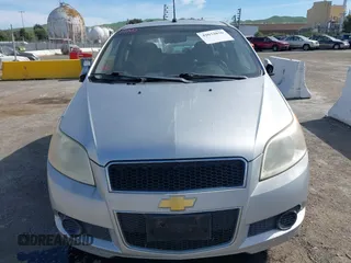 2009 Chevrolet Aveo 1LT with VIN KL1TD66E89B338827, listed as a IAAI auction lot 42033836 with 134,257 mi miles and . Bid and sale history available at DreamBid. Image 6.