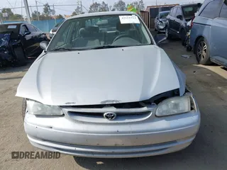 2000 Toyota Corolla VE with VIN 1NXBR12E6YZ393077, listed as a IAAI auction lot 42111914 with 181,056 mi miles and . Bid and sale history available at DreamBid. Image 13.
