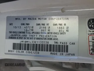 2014 Mazda 3 S Touring with VIN JM1BM1L33E1133538, listed as a Copart auction lot 89395995 with 114,435 mi miles and Salvage Title. Bid and sale history available at DreamBid. Image 12.