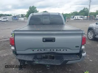 2021 Toyota Tacoma SR with VIN 5TFCZ5AN3MX258746, listed as a IAAI auction lot 42252967 with 62,095 mi miles and . Bid and sale history available at DreamBid. Image 16.