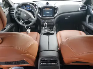 2018 Maserati Ghibli z VIN ZAM57XSA5J1287424, wystawiony jako Copart lot #71215154 z przebiegiem 20 029 mil mil oraz Szkoda całkowita • Salvage title. Historia ofert i sprzedaży dostępna na DreamBid. Obrazek 8.