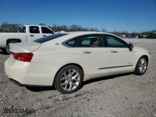 2014 Chevrolet Impala LTZ with VIN 2G1155S35E9156437, listed as a Copart auction lot 42128505 with 141,541 mi miles and Salvage Title. Bid and sale history available at carsss.com. Image 3.