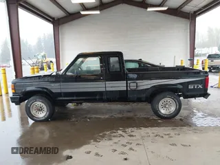 1989 Ford Ranger with VIN 1FTCR15T2KPB41366, listed as a IAAI auction lot 41980273 with 57,772 mi miles. Bid and sale history available at carsss.com. Image 14.