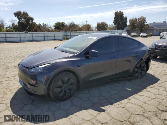 2025 Tesla Model Y Long Range with VIN 7SAYGDED4SF240354, listed as a Copart auction lot 52049745 with 6,785 mi miles and Salvage Title. Bid and sale history available at DreamBid. Image 1.