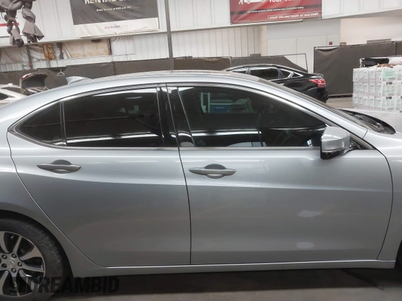 2017 Acura TLX with VIN 19UUB1F31HA007873, listed as a IAAI auction lot 42675667 with 125,869 mi miles and . Bid and sale history available at DreamBid. Image 13.