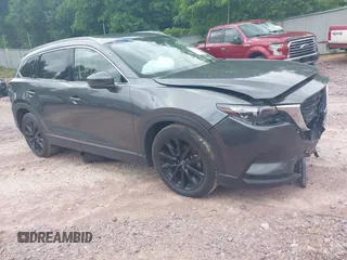2022 Mazda CX-9 Touring Plus with VIN JM3TCBAY2N0611876, listed as a IAAI auction lot 42369073 with 37,639 mi miles and . Bid and sale history available at DreamBid. Image 1.