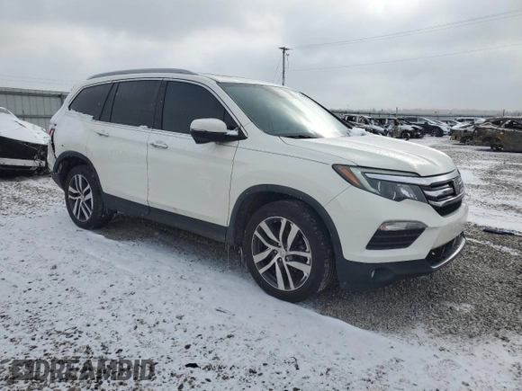 2018 Honda Pilot Touring z VIN 5FNYF6H99JB028034, wystawiony jako Copart lot #45143085 z przebiegiem 70 060 mil mil oraz Szkoda całkowita • Salvage title. Historia ofert i sprzedaży dostępna na DreamBid. Obrazek 4.