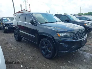 2015 Jeep Grand Cherokee Altitude z VIN 1C4RJFAG7FC932397, wystawiony jako IAAI lot #42689355 z przebiegiem 181 404 mil mil oraz . Historia ofert i sprzedaży dostępna na DreamBid. Obrazek 1.