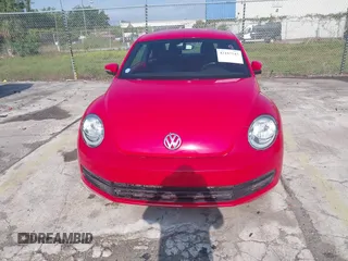 2013 Volkswagen Beetle 2.5L w/Sun/Sound/Nav with VIN 3VWJX7AT4DM672158, listed as a IAAI auction lot 42187543 with 94,961 mi miles and . Bid and sale history available at DreamBid. Image 6.