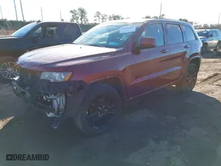 2018 Jeep Grand Cherokee Altitude with VIN 1C4RJFAG6JC157695, listed as a IAAI auction lot 41459907 with 132,540 mi miles. Bid and sale history available at carsss.com. Image 17.