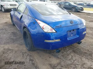 2004 Nissan 350Z Touring with VIN JN1AZ34E04T052916, listed as a IAAI auction lot 41450917 with 157,699 mi miles. Bid and sale history available at carsss.com. Image 13.