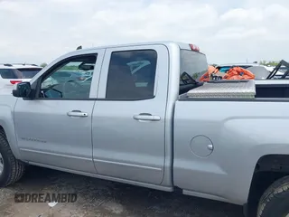 2018 Chevrolet Silverado 1500 LT with VIN 1GCRCREHXJZ336480, listed as a IAAI auction lot 42078864 with 140,366 mi miles and . Bid and sale history available at DreamBid. Image 14.