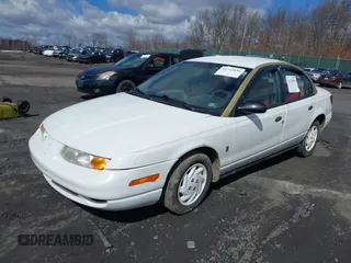 2000 Saturn SL z VIN 1G8ZH5280YZ251280, wystawiony jako IAAI lot #41742836 z przebiegiem 180 249 mil mil oraz . Historia ofert i sprzedaży dostępna na DreamBid. Obrazek 2.