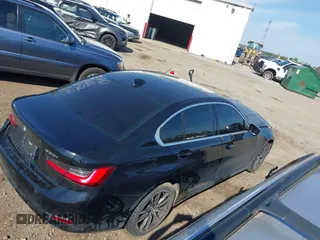 2020 BMW 3 Series 330i xDrive with VIN 3MW5R7J06L8B10285, listed as a IAAI auction lot 39403745 with 58,242 mi miles. Bid and sale history available at carsss.com. Image 4.