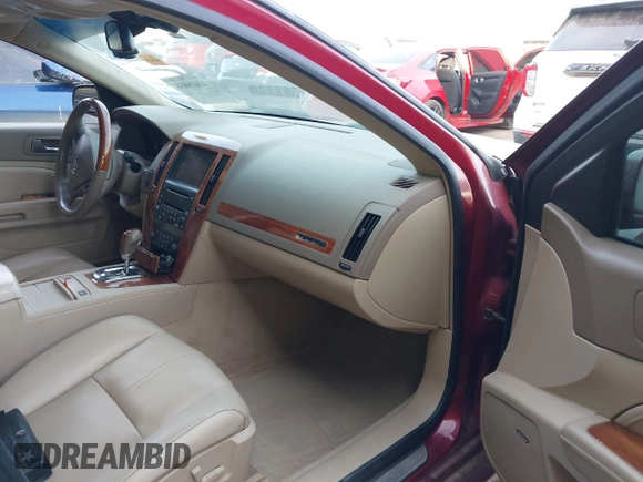 2007 Cadillac STS z VIN 1G6DW677670164260, wystawiony jako IAAI lot #41416838 z przebiegiem 146 860 mil mil oraz . Historia ofert i sprzedaży dostępna na DreamBid. Obrazek 5.