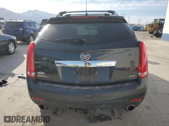 2015 Cadillac SRX Luxury Collection with VIN 3GYFNEE34FS619157, listed as a Copart auction lot 48331665 with 130,477 mi miles and Salvage Title. Bid and sale history available at DreamBid. Image 6.