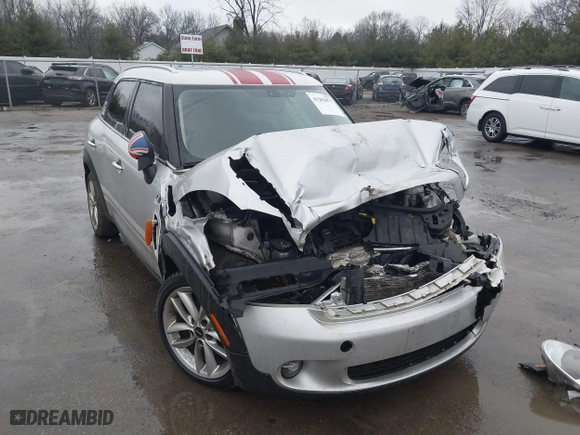 2013 MINI Cooper Countryman with VIN WMWZB3C5XDWR35844, listed as a IAAI auction lot 41203877 with 118,000 mi miles. Bid and sale history available at carsss.com. Image 1.