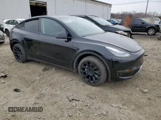 2020 Tesla Model Y Long Range with VIN 5YJYGDEE0LF045391, listed as a Copart auction lot 45642765 with 53,964 mi miles and Salvage Title. Bid and sale history available at DreamBid. Image 4.