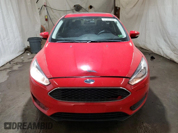 2015 Ford Focus SE with VIN 1FADP3F20FL205273, listed as a Copart auction lot 58627814 with 198,266 mi miles and Salvage title. Bid and sale history available at DreamBid. Image 5.