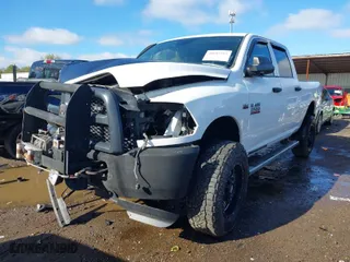 2014 Ram 2500 Tradesman with VIN 3C6TR5CT1EG234972, listed as a IAAI auction lot 40605313 with 170,001 mi miles. Bid and sale history available at carsss.com. Image 2.
