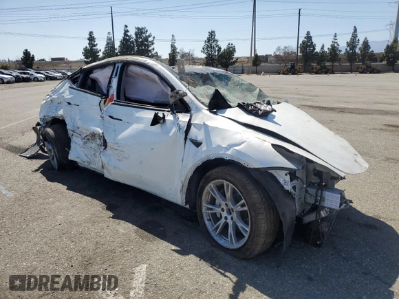 2023 Tesla Model Y Long Range z VIN 7SAYGDEE3PA077841, wystawiony jako Copart lot #54535215 z przebiegiem Nie podano mil oraz Szkoda całkowita • Salvage title. Historia ofert i sprzedaży dostępna na DreamBid. Obrazek 4.
