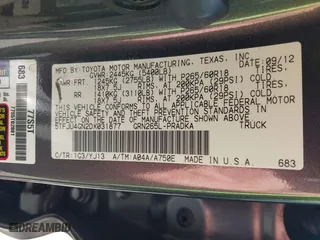 2013 Toyota Tacoma PreRunner with VIN 5TFJU4GN2DX031877, listed as a IAAI auction lot 41532757 with 176,797 mi miles. Bid and sale history available at carsss.com. Image 9.