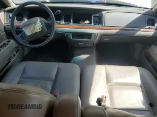 2003 Ford Crown Victoria LX z VIN 2FAFP74W33X141881, wystawiony jako Copart lot #54204695 z przebiegiem 98 466 mil mil oraz Szkoda całkowita • Salvage title. Historia ofert i sprzedaży dostępna na DreamBid. Obrazek 8.