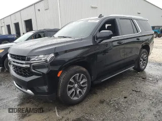 2021 Chevrolet Tahoe LS with VIN 1GNSCMKD4MR335973, listed as a Copart auction lot 69972594 with 42,129 mi miles and Salvage title. Bid and sale history available at DreamBid. Image 1.