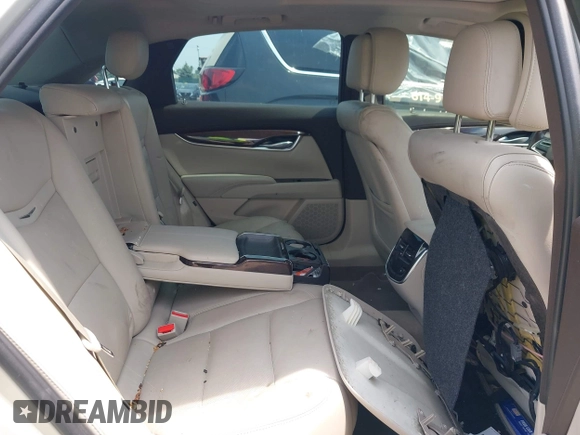 2014 Cadillac XTS Luxury z VIN 2G61M5S38E9291182, wystawiony jako IAAI lot #42495838 z przebiegiem 104 941 mil mil oraz . Historia ofert i sprzedaży dostępna na DreamBid. Obrazek 8.