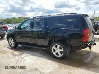 2014 Chevrolet Suburban LT with VIN 1GNSKJE77ER193143, listed as a Copart auction lot 54311935 with 171,407 mi miles and Salvage Title. Bid and sale history available at DreamBid. Image 2.