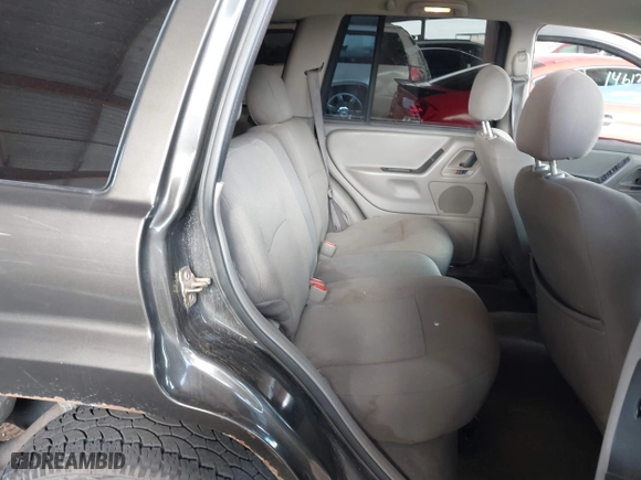 2004 Jeep Grand Cherokee Laredo with VIN 1J4GX48N64C436853, listed as a IAAI auction lot 41785918 with 118,578 mi miles. Bid and sale history available at carsss.com. Image 8.