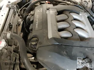 2002 Honda Accord EX z VIN 1HGCG22502A022690, wystawiony jako IAAI lot #42289605 z przebiegiem 198 482 mil mil oraz . Historia ofert i sprzedaży dostępna na DreamBid. Obrazek 19.