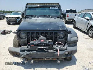 2020 Jeep Wrangler Sport with VIN 1C4GJXAGXLW237080, listed as a Copart auction lot 57769704 with 144,137 mi miles and Salvage title. Bid and sale history available at DreamBid. Image 5.