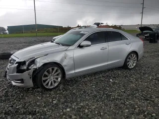 2015 Cadillac ATS Sedan Luxury RWD with VIN 1G6AB5RA9F0105705, listed as a Copart auction lot 71349974 with 124,081 mi miles and Salvage Title. Bid and sale history available at carsss.com. Image 1.