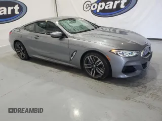 2025 BMW 8 Series 840i with VIN WBAAE4C01SCS11313, listed as a Copart auction lot 73431104 with 4,605 mi miles and Clean Title. Bid and sale history available at carsss.com. Image 4.