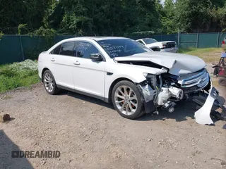 2014 Ford Taurus Limited with VIN 1FAHP2F8XEG181491, listed as a IAAI auction lot 40277144 with 107,374 mi miles. Bid and sale history available at carsss.com. Image 1.
