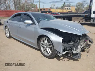 2016 Audi A8 Sport z VIN WAU43AFD0GN011518, wystawiony jako IAAI lot #42096343 z przebiegiem Nie podano mil oraz . Historia ofert i sprzedaży dostępna na DreamBid. Obrazek 1.