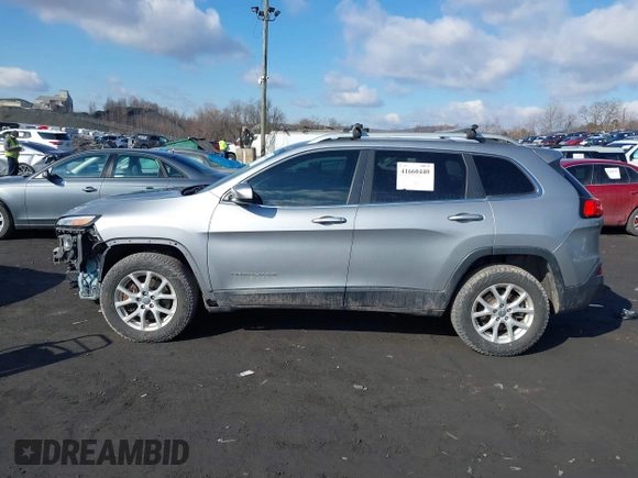 2014 Jeep Cherokee Altitude with VIN 1C4PJMCB5EW167961, listed as a IAAI auction lot 41660440 with 88,705 mi miles and . Bid and sale history available at DreamBid. Image 14.