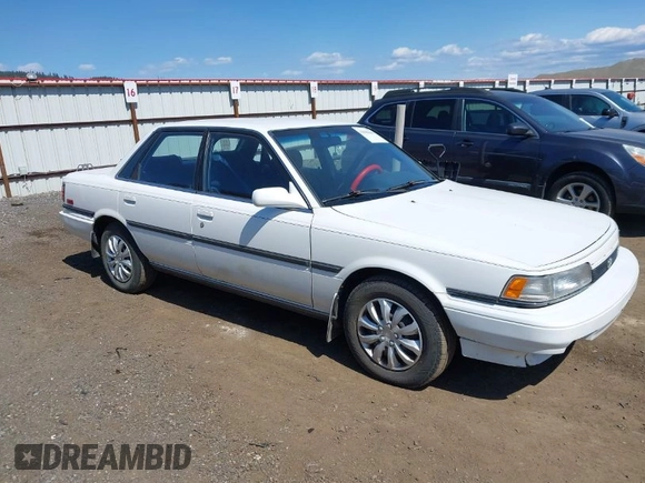 1990 Toyota Camry LE ECT z VIN JT2SV22E1L3427911, wystawiony jako IAAI lot #42040646 z przebiegiem 133 129 mil mil oraz . Historia ofert i sprzedaży dostępna na DreamBid. Obrazek 1.