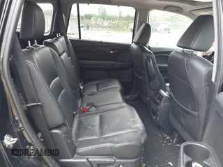 2020 Honda Pilot EX-L with VIN 5FNYF6H57LB059332, listed as a IAAI auction lot 42614422 with 110,279 mi miles and . Bid and sale history available at DreamBid. Image 8.