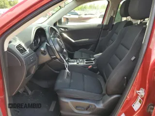 2016 Mazda CX-5 Touring with VIN JM3KE2CY0G0627886, listed as a Copart auction lot 55207054 with 95,884 mi miles and Salvage Title. Bid and sale history available at carsss.com. Image 7.