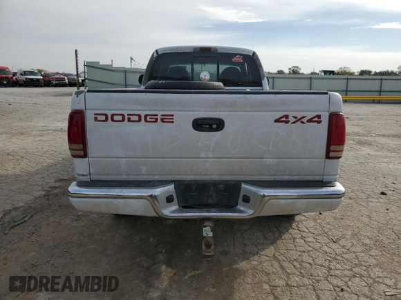 1997 Dodge Dakota z VIN 1B7GG23Y8VS161313, wystawiony jako Copart lot #77646454 z przebiegiem 286 443 mil mil oraz Szkoda całkowita • Salvage title. Historia ofert i sprzedaży dostępna na DreamBid. Obrazek 6.