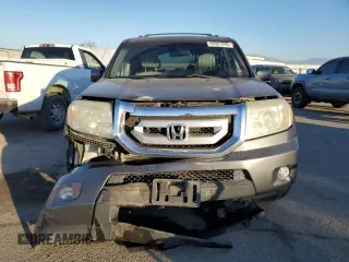 2011 Honda Pilot EX-L with VIN 5FNYF3H72BB008965, listed as a Copart auction lot 88961845 with 128,443 mi miles and Salvage Title. Bid and sale history available at DreamBid. Image 5.