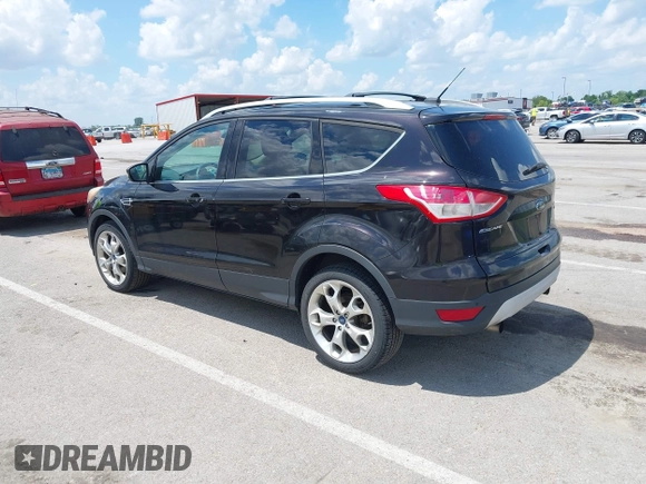 2013 Ford Escape Titanium with VIN 1FMCU9J90DUA01551, listed as a IAAI auction lot 42686247 with 190,707 mi miles and . Bid and sale history available at DreamBid. Image 3.