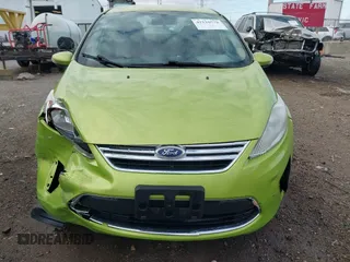 2013 Ford Fiesta SE z VIN 3FADP4BJ9DM184289, wystawiony jako IAAI lot #42110578 z przebiegiem 166 764 mil mil oraz . Historia ofert i sprzedaży dostępna na DreamBid. Obrazek 12.